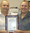 Ivan Popov (left) and John Eigelaar show off Keystone’s BBBEE certificate